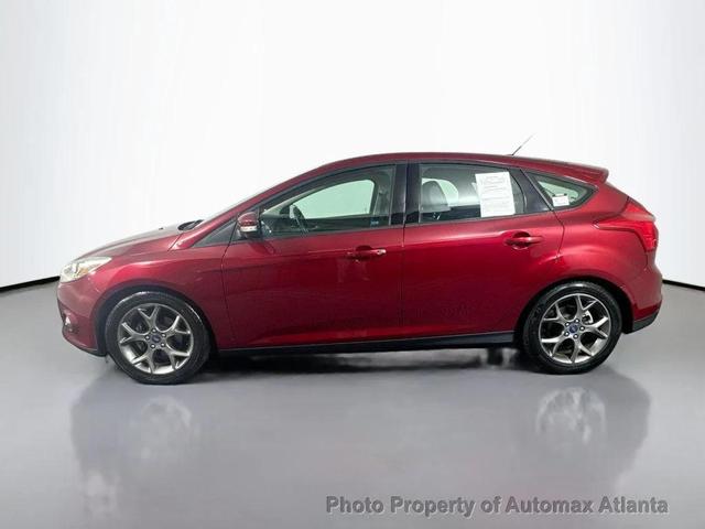 Photo of 2014 Ruby Red Tinted Clearcoat Ford Focus