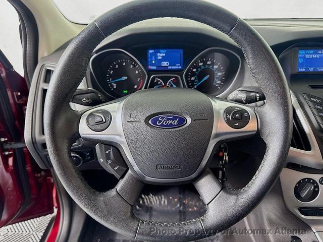 Photo of 2014 Ruby Red Tinted Clearcoat Ford Focus