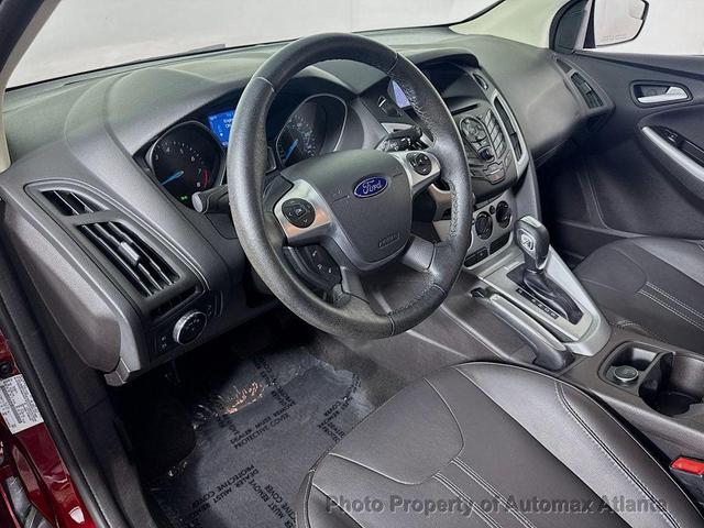 Photo of 2014 Ruby Red Tinted Clearcoat Ford Focus