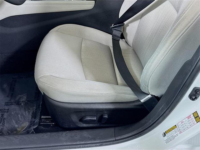 Photo of 2023 Pearl White Tricoat Nissan Altima