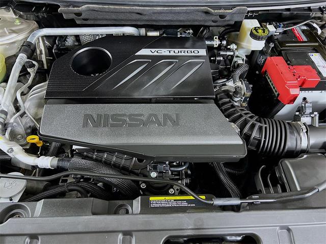 Photo of 2022 Champagne Silver Metallic Nissan Rogue