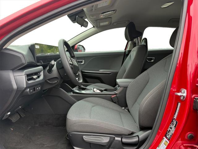 Photo of 2025 Currant Red Kia K4
