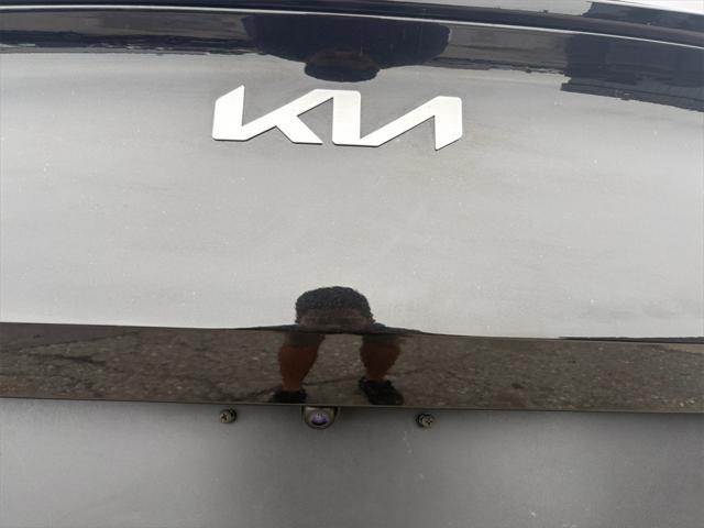 Photo of 2023 Fusion Black Kia Sportage Hybrid
