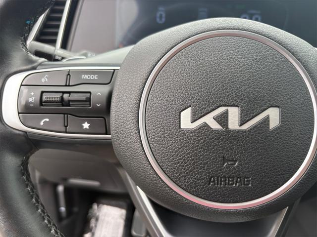 Photo of 2023 Fusion Black Kia Sportage Hybrid