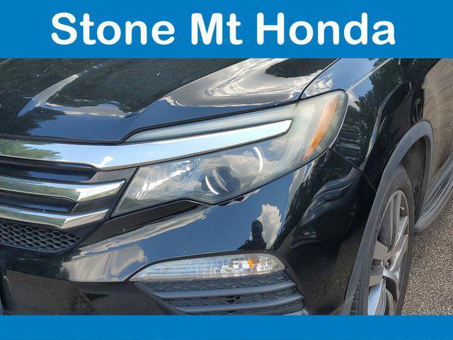 Photo of 2017 Crystal Black Pearl Honda Pilot