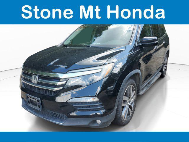 Photo of 2017 Crystal Black Pearl Honda Pilot