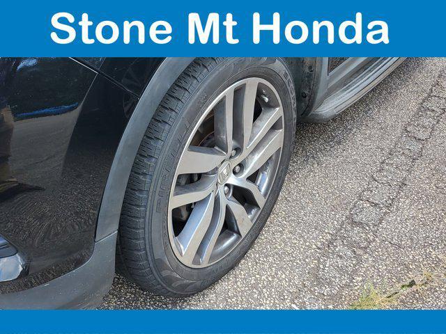 Photo of 2017 Crystal Black Pearl Honda Pilot
