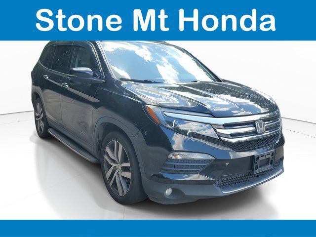 Photo of 2017 Crystal Black Pearl Honda Pilot