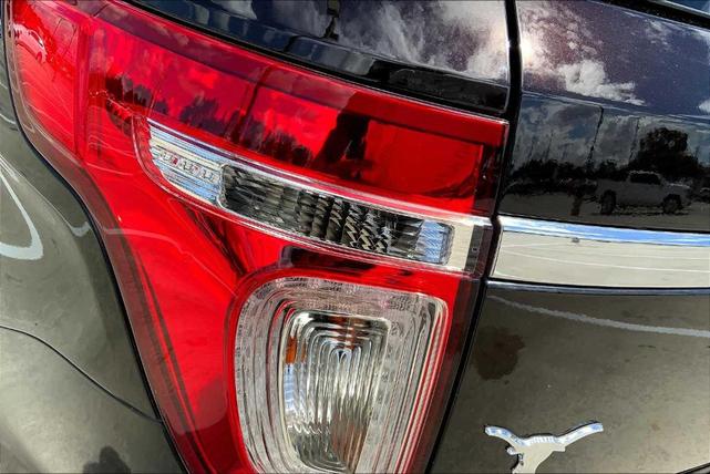 Photo of 2014 Kodiak Brown Metallic Ford Explorer