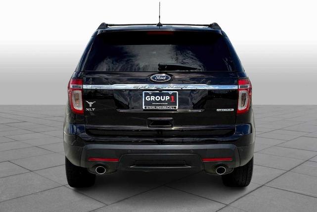 Photo of 2014 Kodiak Brown Metallic Ford Explorer