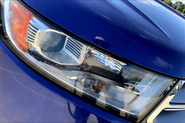 Photo of 2015 Deep Impact Blue Metallic Ford Edge