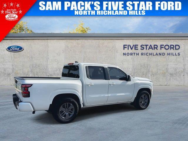 Photo of 2025 Glacier White Nissan Frontier