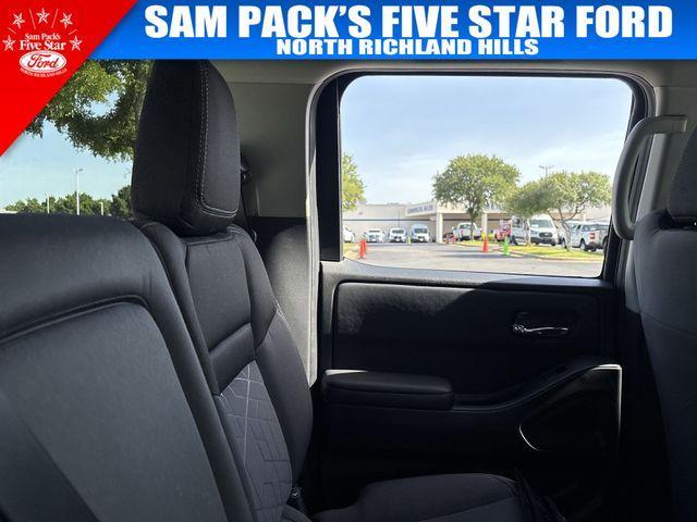 Photo of 2025 Glacier White Nissan Frontier