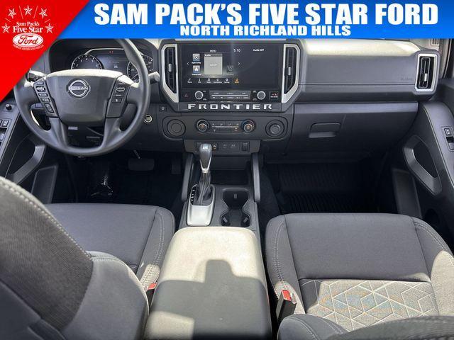 Photo of 2025 Glacier White Nissan Frontier