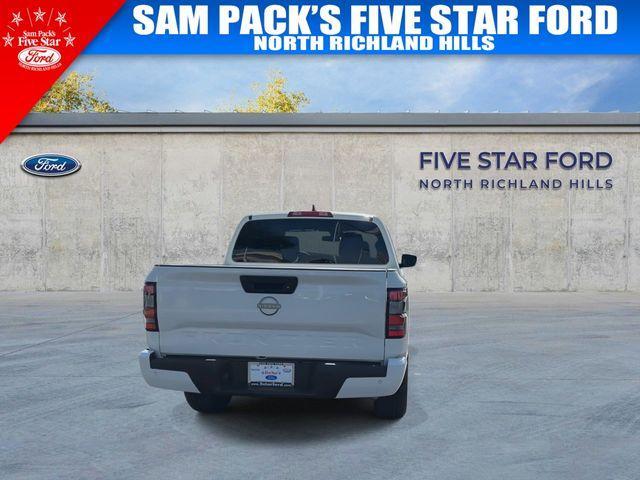 Photo of 2025 Glacier White Nissan Frontier