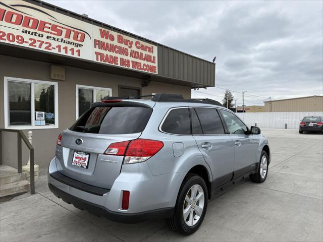 Photo of 2014 Blue Subaru Outback