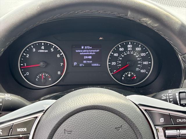 Photo of 2023 Cherry Black Kia Seltos
