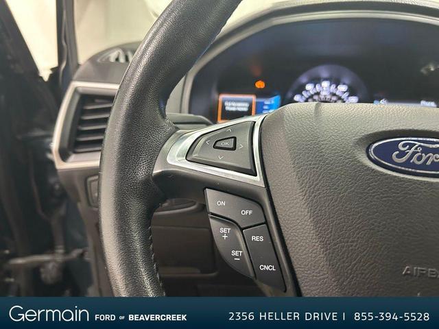 Photo of 2022 Stone Blue Metallic Ford Edge