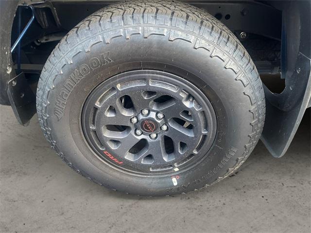 Photo of 2025 Bluestone Pearl Nissan Frontier