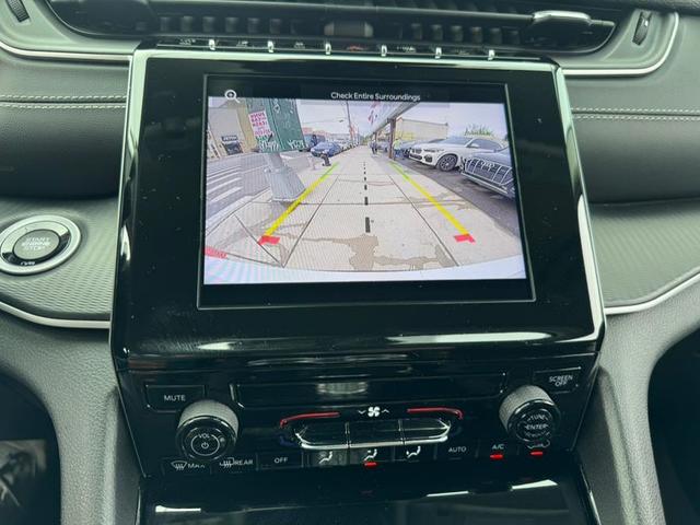 Photo of 2023 White Jeep Grand Cherokee L