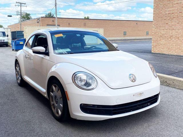 Photo of 2013 Candy White Volkswagen Beetle