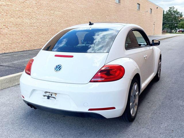 Photo of 2013 Candy White Volkswagen Beetle