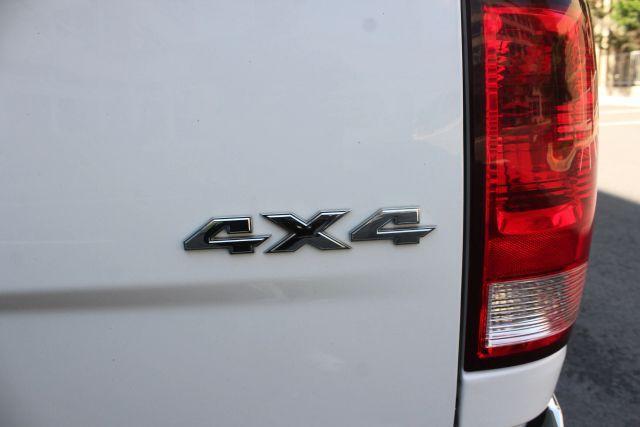 Photo of 2014 White RAM 1500