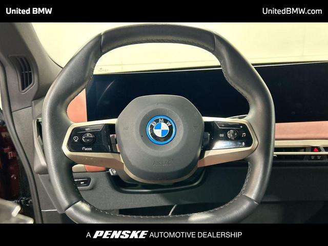 Photo of 2025 Aventurin Red Metallic BMW iX