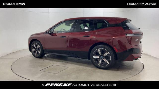 Photo of 2025 Aventurin Red Metallic BMW iX