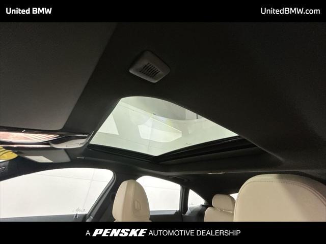 Photo of 2025 Jet Black BMW i4 Gran Coupe
