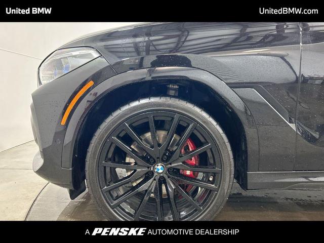 Photo of 2023 Black Sapphire Metallic BMW X6