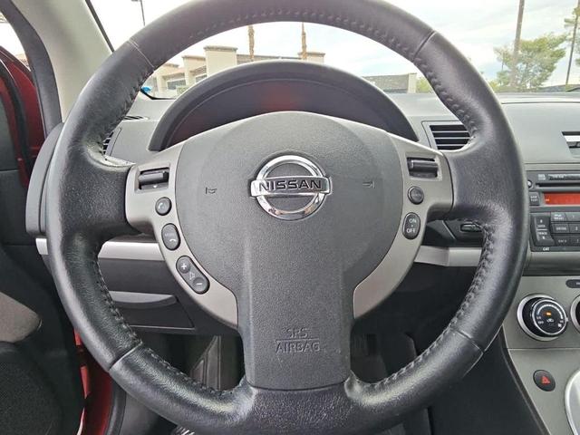Photo of 2011 Red Brick Nissan Sentra