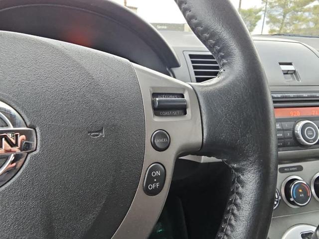Photo of 2011 Red Brick Nissan Sentra
