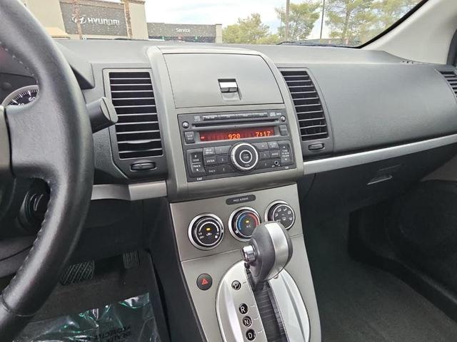 Photo of 2011 Red Brick Nissan Sentra