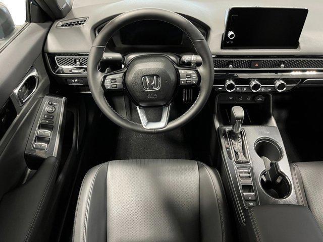 Photo of 2026 Platinum White Pearl Honda Civic Hybrid