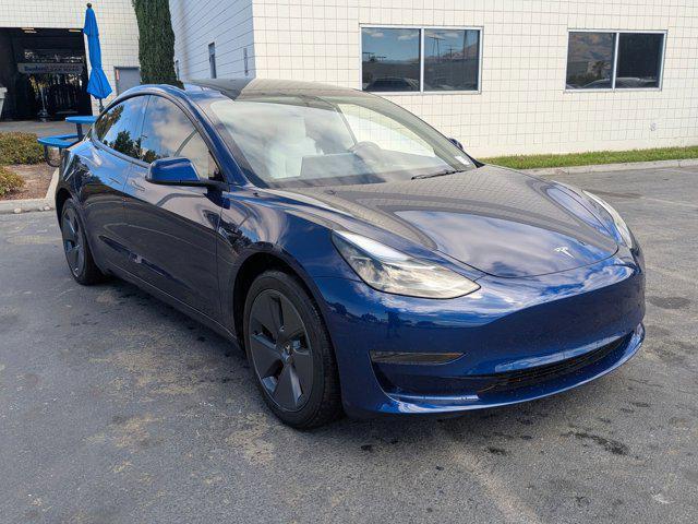Photo of 2023 Deep Blue Metallic Tesla Model 3