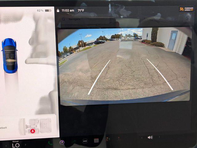 Photo of 2023 Deep Blue Metallic Tesla Model 3