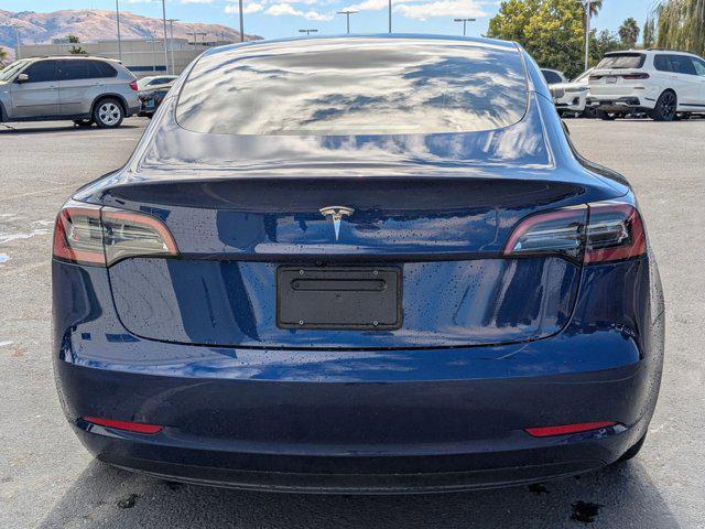 Photo of 2023 Deep Blue Metallic Tesla Model 3