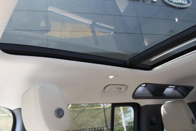 Photo of 2024 Tasman Blue Metallic Land Rover Defender