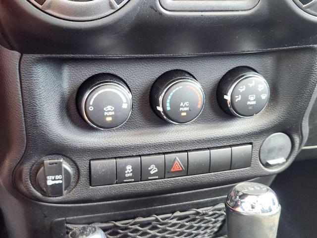 Photo of 2014 Red Jeep Wrangler Unlimited