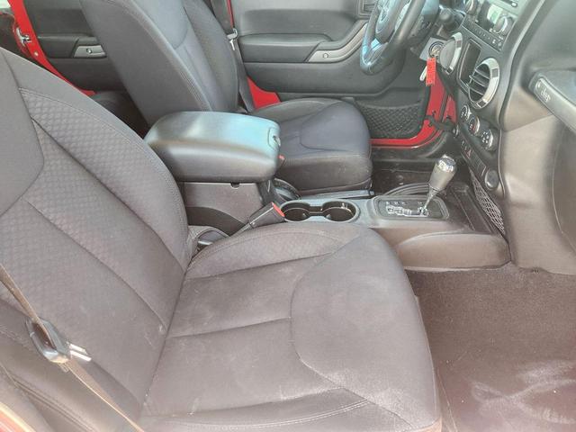Photo of 2014 Red Jeep Wrangler Unlimited