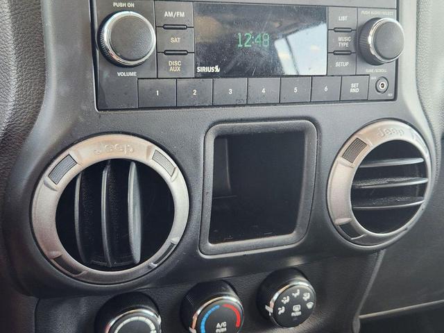 Photo of 2014 Red Jeep Wrangler Unlimited