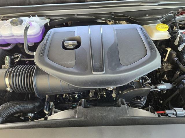 Photo of 2025 Delmonico Red Pearlcoat RAM 1500