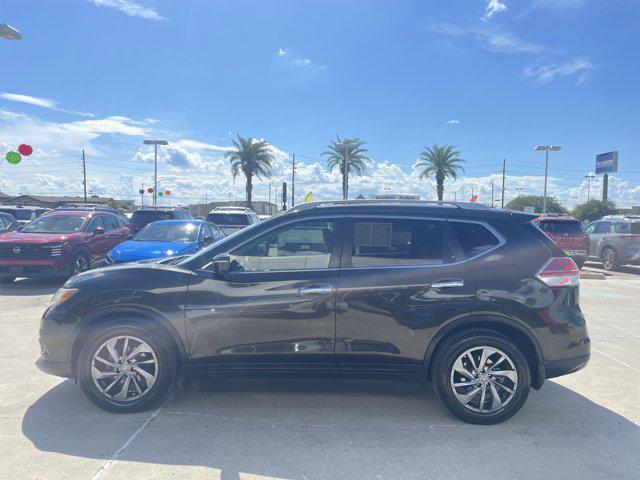 Photo of 2015 Midnight Jade Nissan Rogue