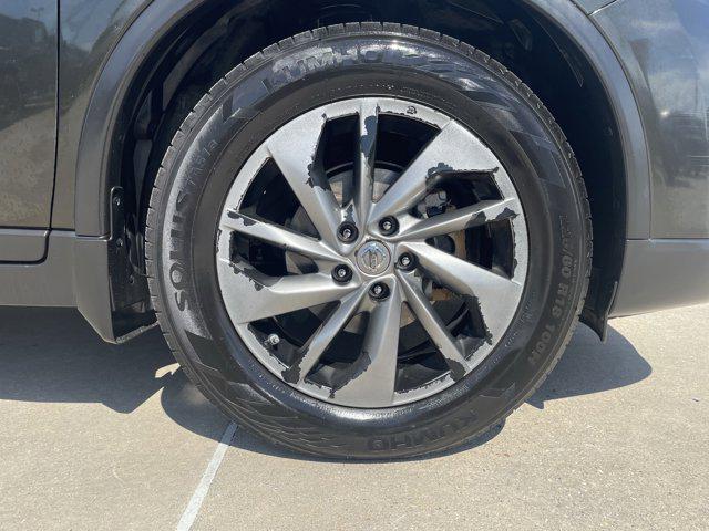 Photo of 2015 Midnight Jade Nissan Rogue