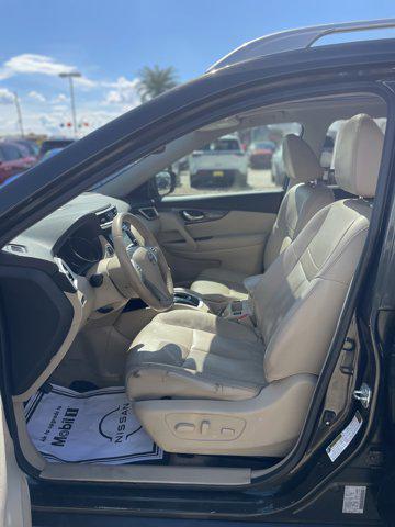 Photo of 2015 Midnight Jade Nissan Rogue