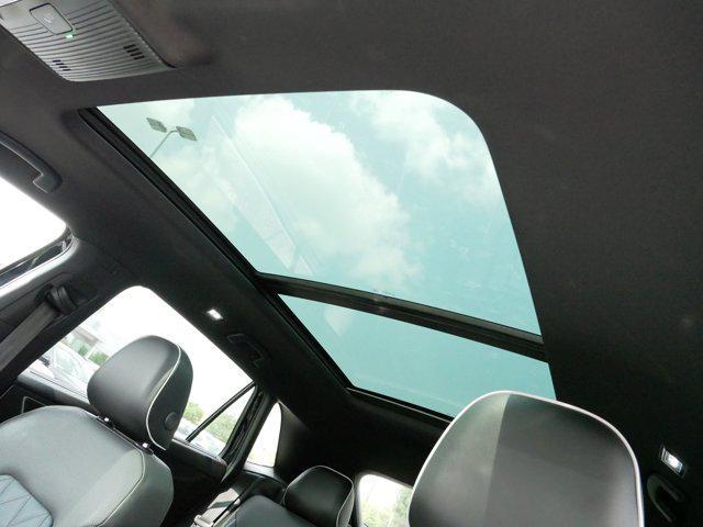 Photo of 2024 Deep Black Pearl Volkswagen Atlas Cross Sport