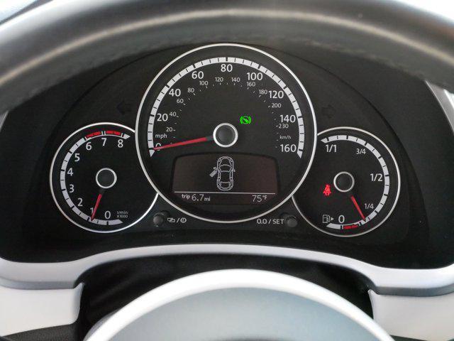 Photo of 2013 White Volkswagen Beetle