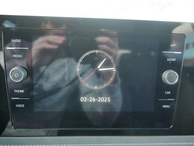 Photo of 2025 Monument Gray w/Deep Black Roof Volkswagen Taos