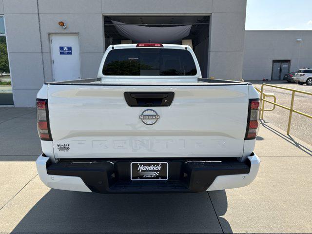 Photo of 2025 Glacier White Nissan Frontier